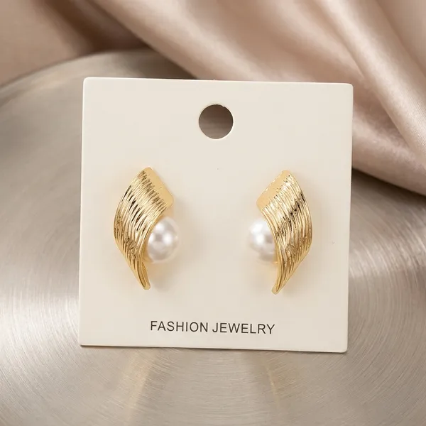 Gold_Toned_Wing_Design_Pearl_Stud_Earrings_For_Women