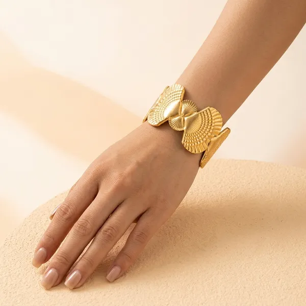 Gold_Toned_Textured_Shell_Design_Cuff_Bracelet_For_Women