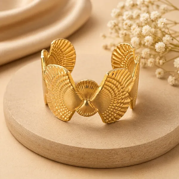 Gold_Toned_Textured_Shell_Design_Cuff_Bracelet_For_Women