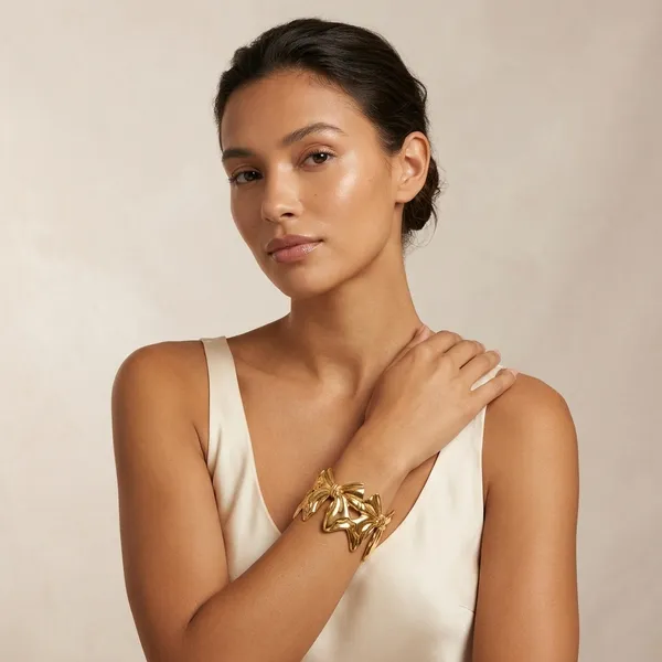 Gold_Toned_Bow_Design_Statement_Bracelet_For_Women
