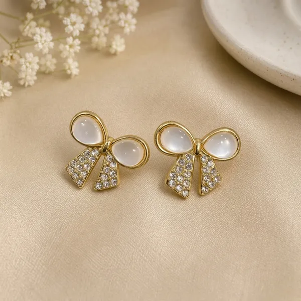 Gold_Toned_Bow_Design_Stud_Earrings_For_Women