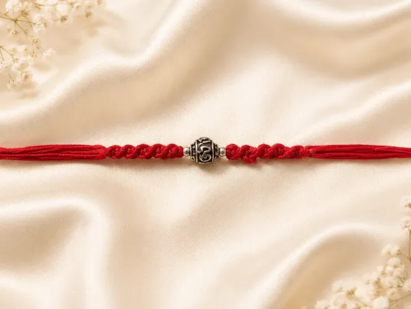 Silvering_Om_Bead_925_Silver_Thread_Bracelet_Rakhi