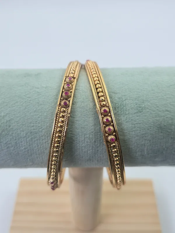 Traditional_Bangles_Sleek_Knot_Ruby_Set_Of_2