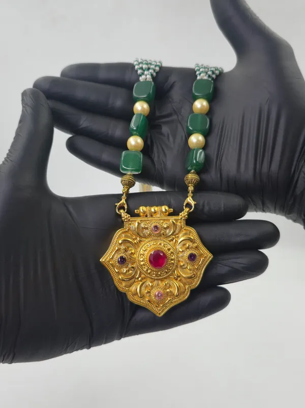 Sheild_Or_Medallion_Red_Traditional_Gau_Haar