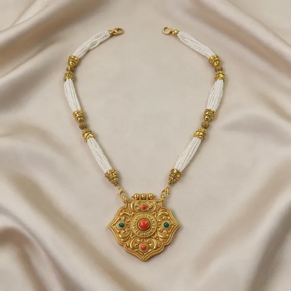 Sheild_Or_Medallion_Coral_Traditional_Gau_Haar