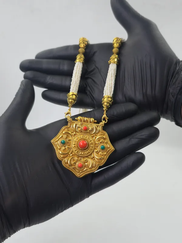 Sheild_Or_Medallion_Coral_Traditional_Gau_Haar