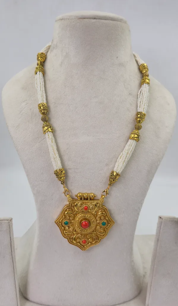 Sheild_Or_Medallion_Coral_Traditional_Gau_Haar