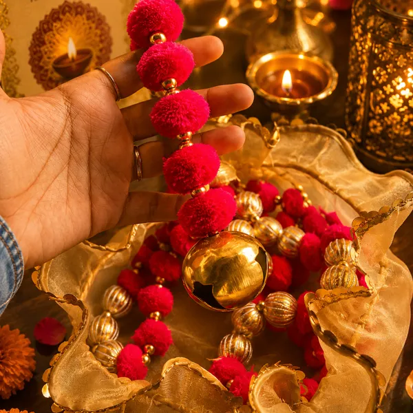 Jute_Festive_Golden_Potli_With_Pink_Toran