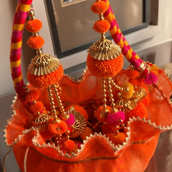 Jute_Festive_Diwali_Orange_Potli_With_Festive_Toran
