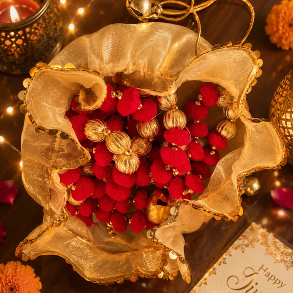 Jute_Festive_Golden_Potli_With_Pink_Toran