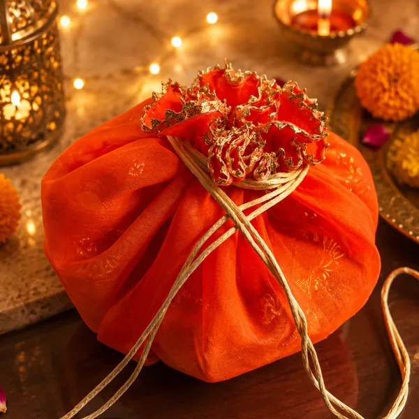 Jute_Festive_Diwali_Orange_Potli_With_Festive_Toran