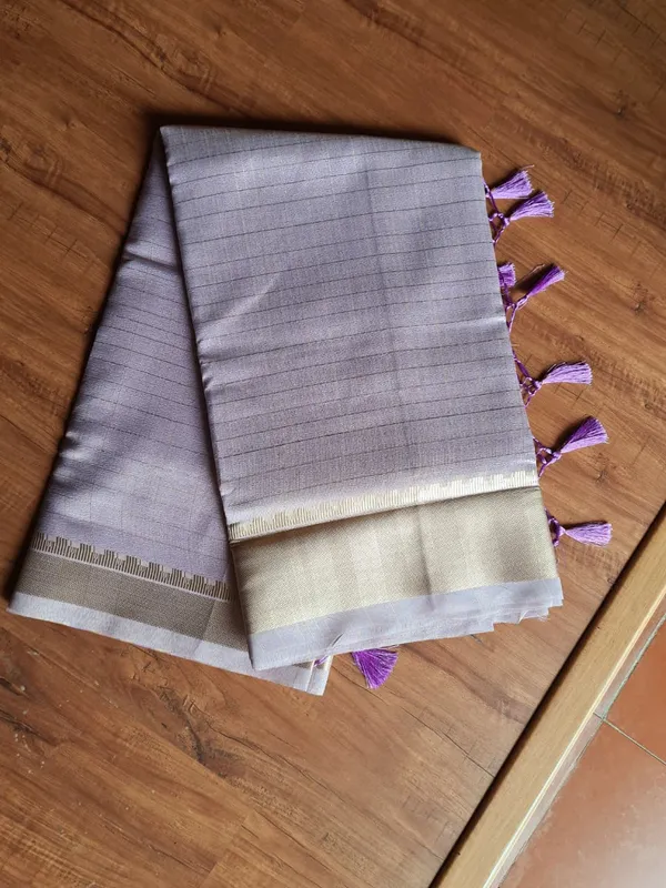 Lavender_Silk_Woven_Border_Saree_With_Tassels_For_Women