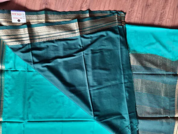Teal_Semi_Crepe_Silk_Zari_Border_Ethnic_Saree_For_Women