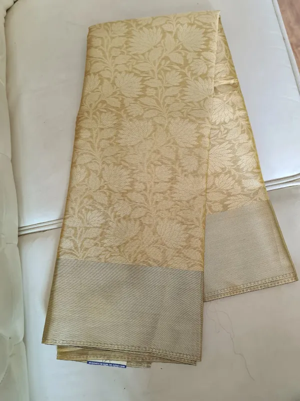 Premium_Soft_Tissue_Golden_Cream_Zari_Woven_Saree_With_Blouse