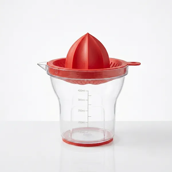 Plastic_Manual_Red_Citrus_Juicer_With_Measuring_Cup