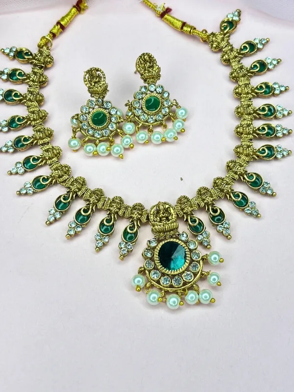 Gold-Plated_Green_Stone_And_Kundan_Studded_Lakshmi_Temple_Necklace_Jewellery_Set