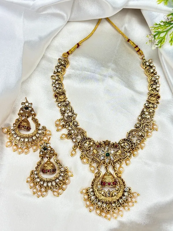 Gold-Plated_Kundan_Stone-Studded_Peacock_&_Jhumka_Pendant_Necklace_Jewellery_Set