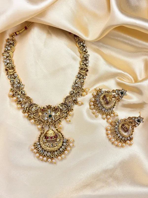 Gold-Plated_Kundan_Stone-Studded_Peacock_&_Jhumka_Pendant_Necklace_Jewellery_Set