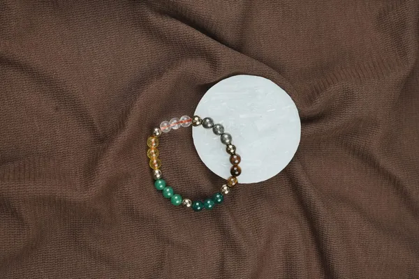Pyrite_Wealth_Bracelet_With_Free_Selenite_Charging_Plate
