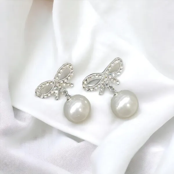 Silver_Crystal_Studded_Bow_Shape_Drop_Earrings_For_Women_Pack_Of_3