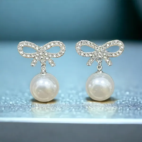 Silver_Crystal_Studded_Bow_Shape_Drop_Earrings_For_Women_Pack_Of_3