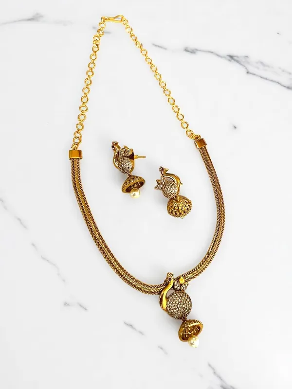 Gold_Brass_Peacock_American_Diamond_Pearl_Drop_Necklace_Set_For_Women
