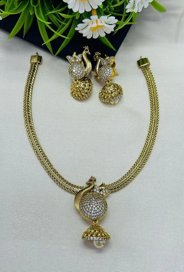Gold_Brass_Peacock_American_Diamond_Pearl_Drop_Necklace_Set_For_Women