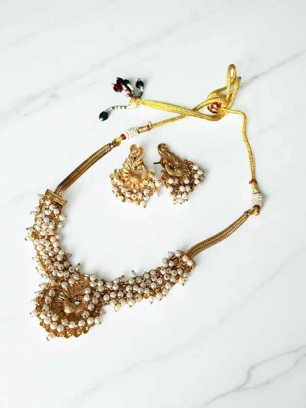 Gold_Brass_Peacock_Pearl_Temple_Necklace_Set_For_Women