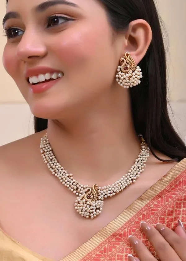 Gold_Brass_Peacock_Pearl_Temple_Necklace_Set_For_Women