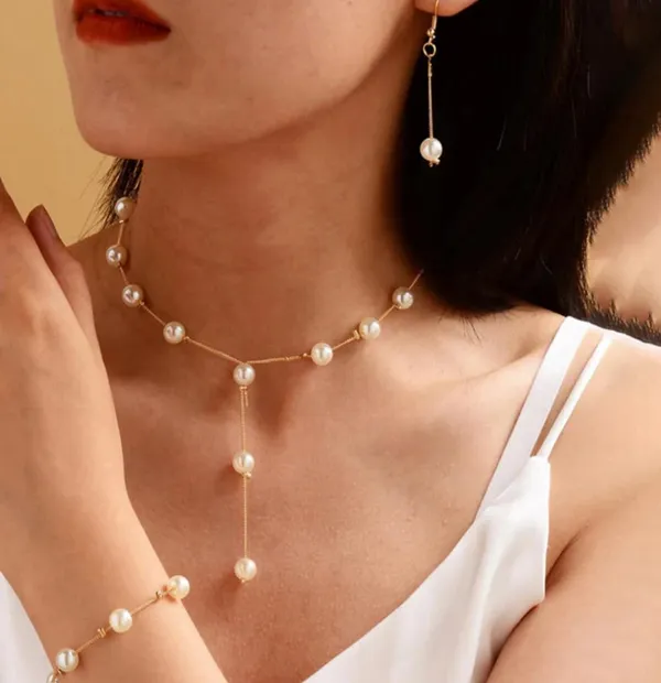 Gold_Alloy_Pearl_Finish_Necklace_Earrings_Ring_Bracelet_Set_For_Women_Pack_Of_4