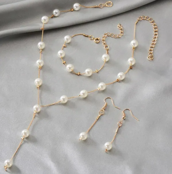 Gold_Alloy_Pearl_Finish_Necklace_Earrings_Ring_Bracelet_Set_For_Women_Pack_Of_4