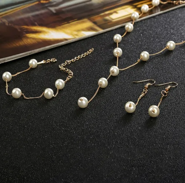 Gold_Alloy_Pearl_Finish_Necklace_Earrings_Ring_Bracelet_Set_For_Women_Pack_Of_4