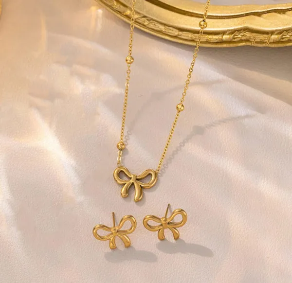 Gold_Stainless_Steel_Bow_Pendant_Necklace_Earrings_Set_For_Women_Pack_Of_2