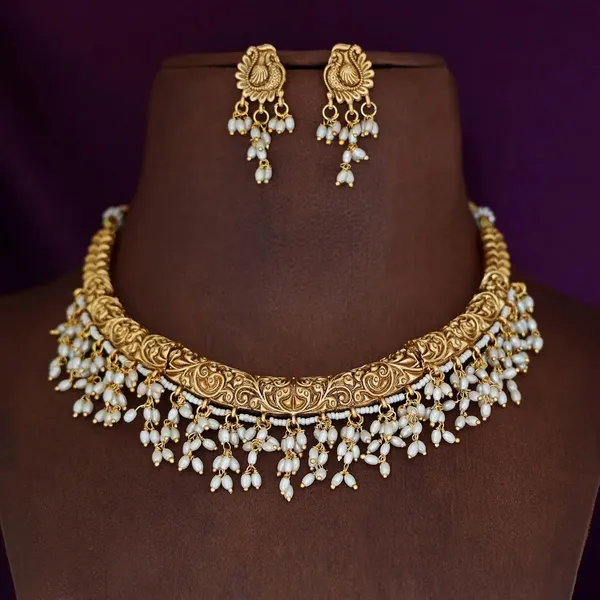 Gold_Brass_Pearl_Temple_Hasli_Necklace_Set_For_Women