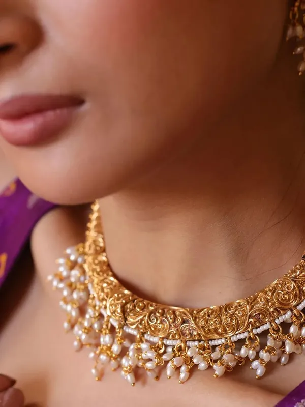 Gold_Brass_Pearl_Temple_Hasli_Necklace_Set_For_Women