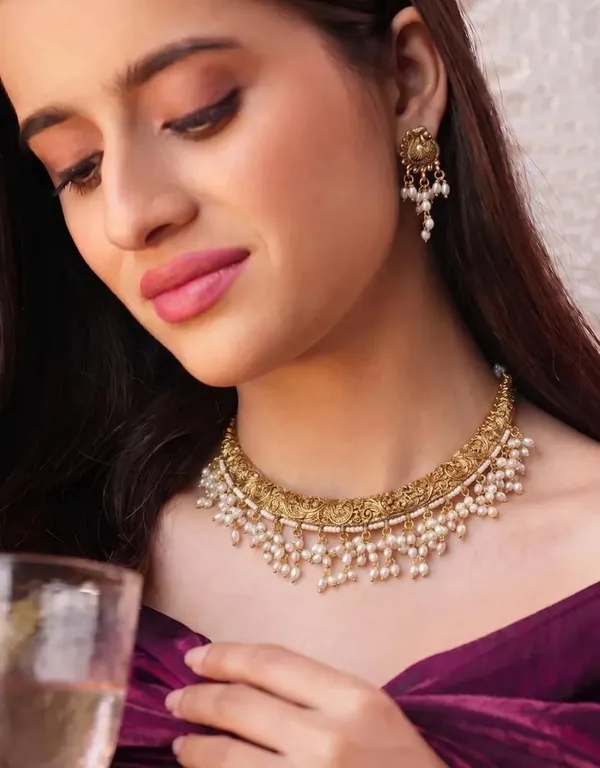 Gold_Brass_Pearl_Temple_Hasli_Necklace_Set_For_Women