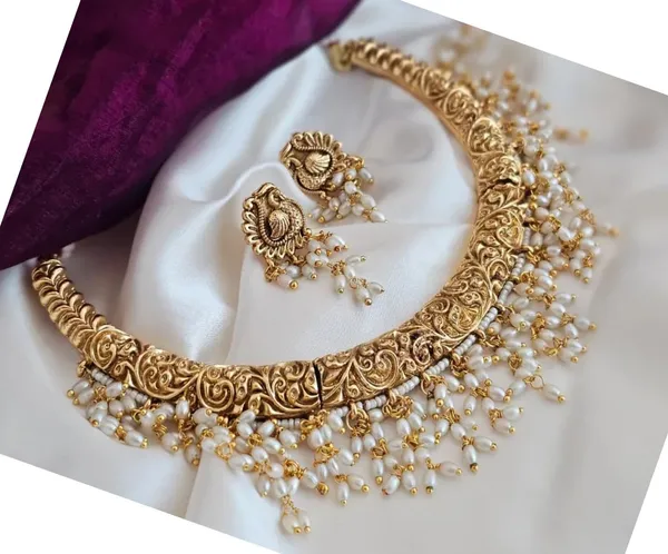 Gold_Brass_Pearl_Temple_Hasli_Necklace_Set_For_Women
