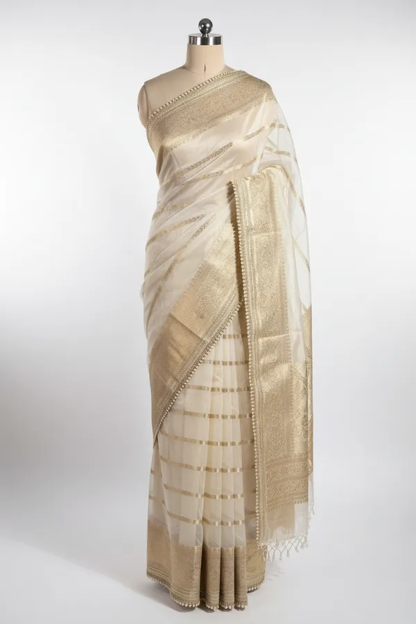 Ivory_banarasi_organza_silk_saree_with_premium_lace_work