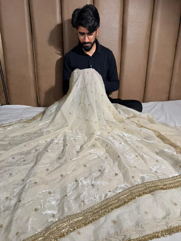 Ivory_shimmery_tissue_silk_designer_saree