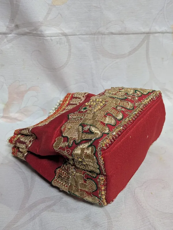 Red_Silk_Elephant_Embroidered_Pearl_Handle_Potli_Bag_For_Women