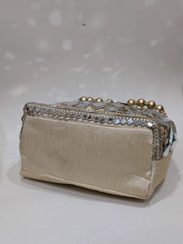 Golden_Silk_Mirror_Work_Embellished_Potli_Bag_For_Women