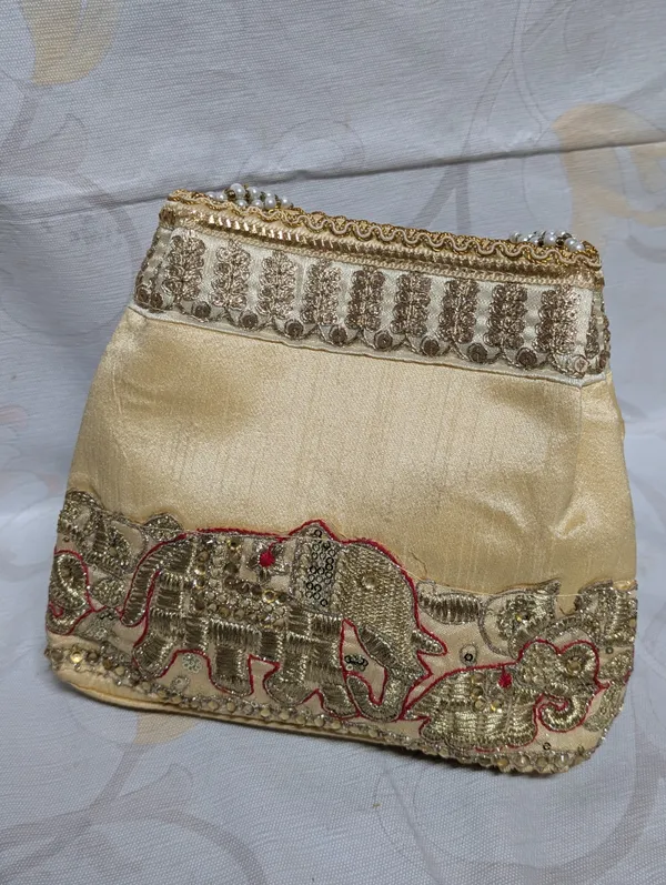 Cream_Silk_Gold_Peacock_Potli_Bag_For_Women