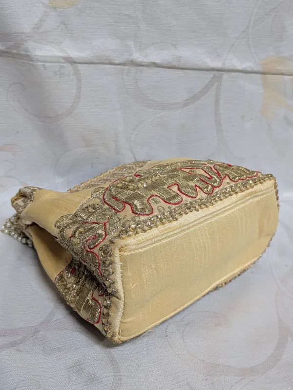 Cream_Silk_Gold_Peacock_Potli_Bag_For_Women