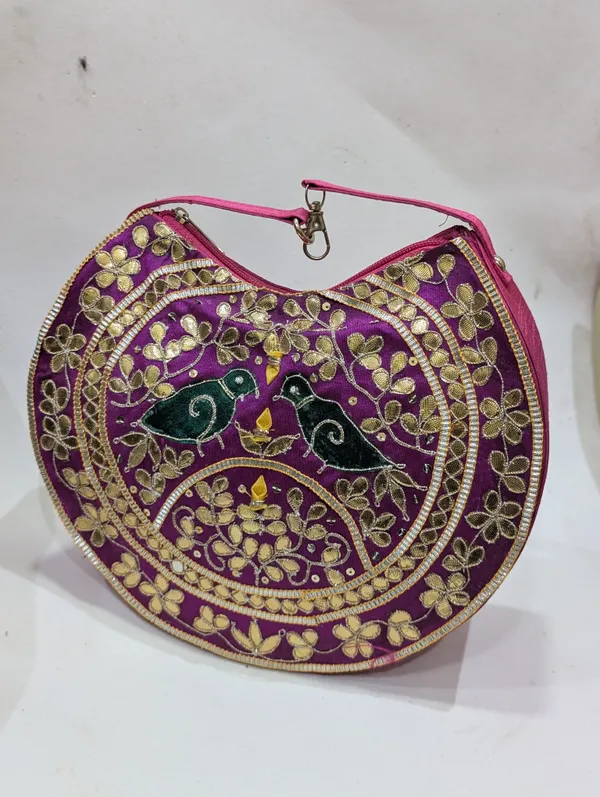 Purple_Silk_Embroidered_Bird_Motif_Round_Clutch_For_Women
