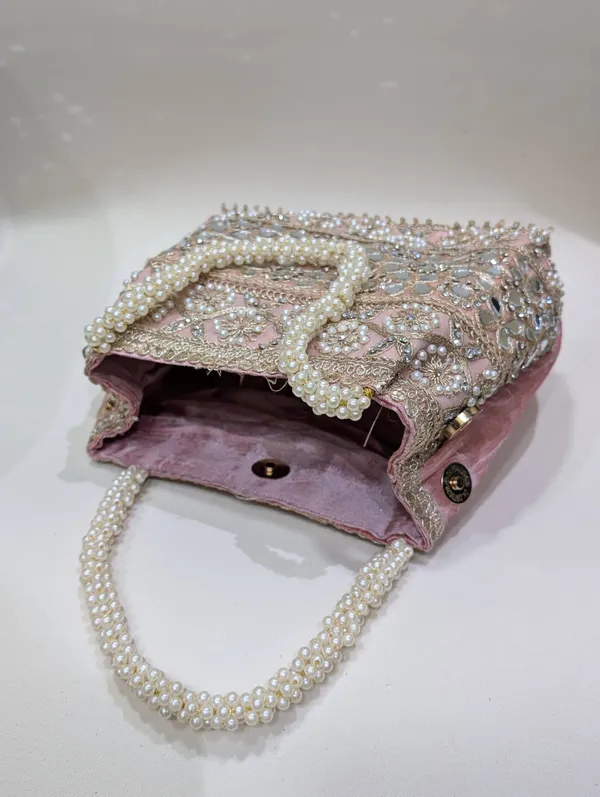 Gajri_Silk_Mirror_Work_Pearl_Handle_Potli_Clutch_For_Women