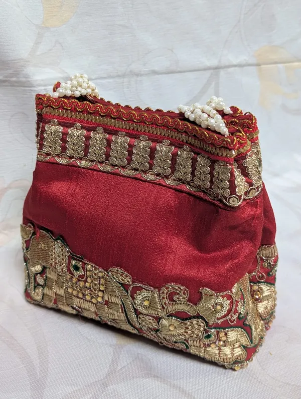 Red_Silk_Elephant_Embroidered_Pearl_Handle_Potli_Bag_For_Women