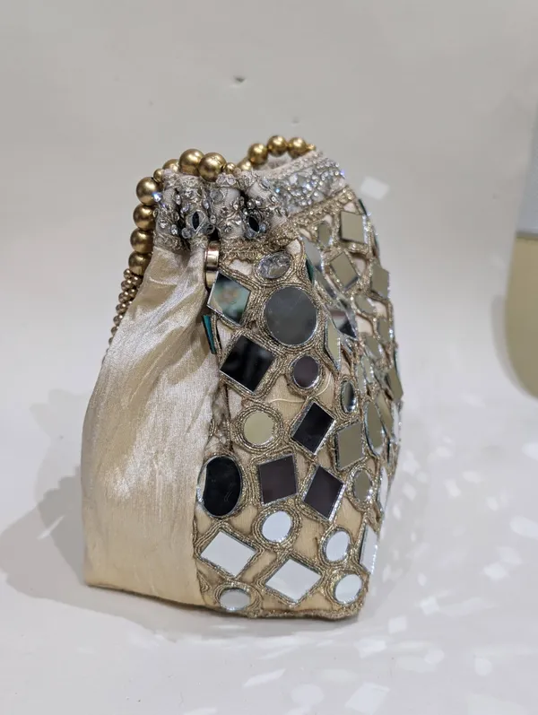 Golden_Silk_Mirror_Work_Embellished_Potli_Bag_For_Women
