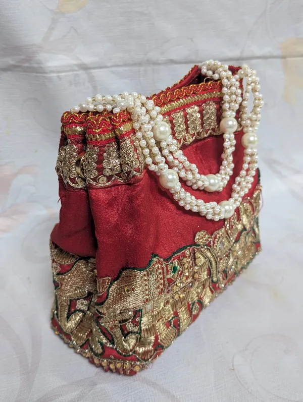 Red_Silk_Elephant_Embroidered_Pearl_Handle_Potli_Bag_For_Women