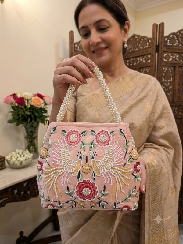 Pink_Velvet_Pearl_Handle_Embroidered_Potli_Bag_For_Women