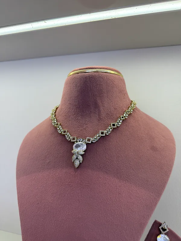 Gold_And_Silver_drop_necklace_set_for_Women_with_earrings